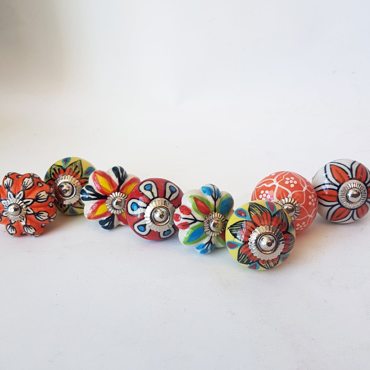 Tropicale collection of 8 designer hand painted knob pulls for cabinets and cupboards, dresser drawers. Exclusive vibrant floral designs.