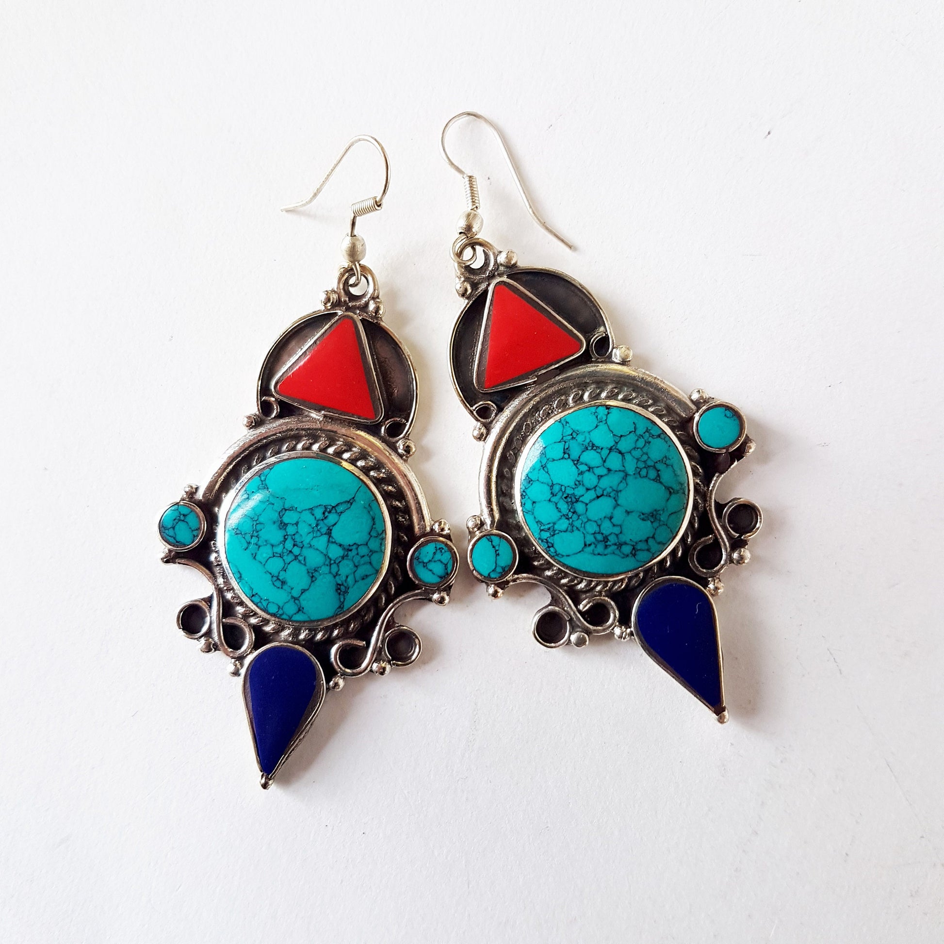 Ethnic boho dangle earrings. Antique silver finish mixed with turquoise, coral and lapis. Light weight. 2.5 inches by 1.25 inches. - Vintage India Ca