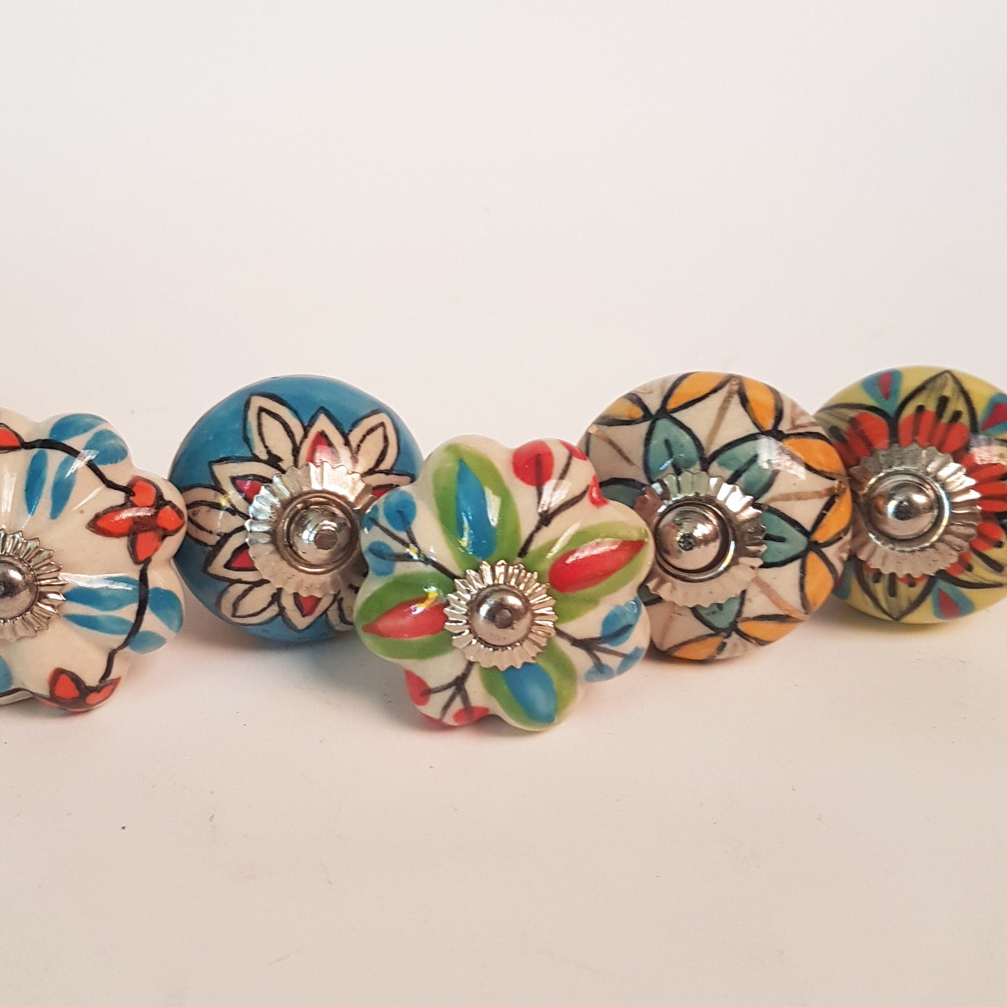 Secret Garden collection of 8 hand painted designer cupboard & drawer knobs in colorful floral patterns. Standard 1.5 inch diameter size. - Vintage India Ca