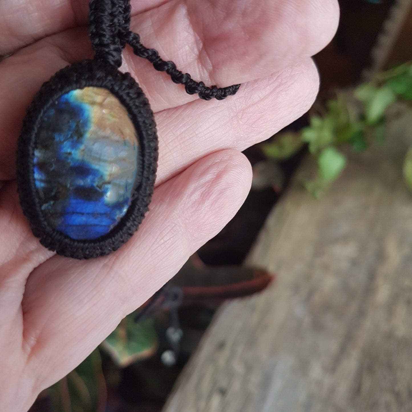 Gender neutral design labradorite pendant necklace. Hangs on a 20 inch black woven corkscrew knot cord. Adjustable length. Unisex jewelry. - Vintage India Ca