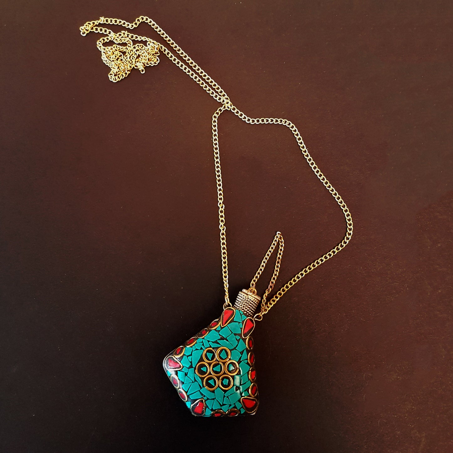 Perfume bottle pendant in a stone mosaic design. Inlaid withTibetan turquoise, lapis & MOP stones. Bottle closes with a brass wand stopper. - Vintage India Ca