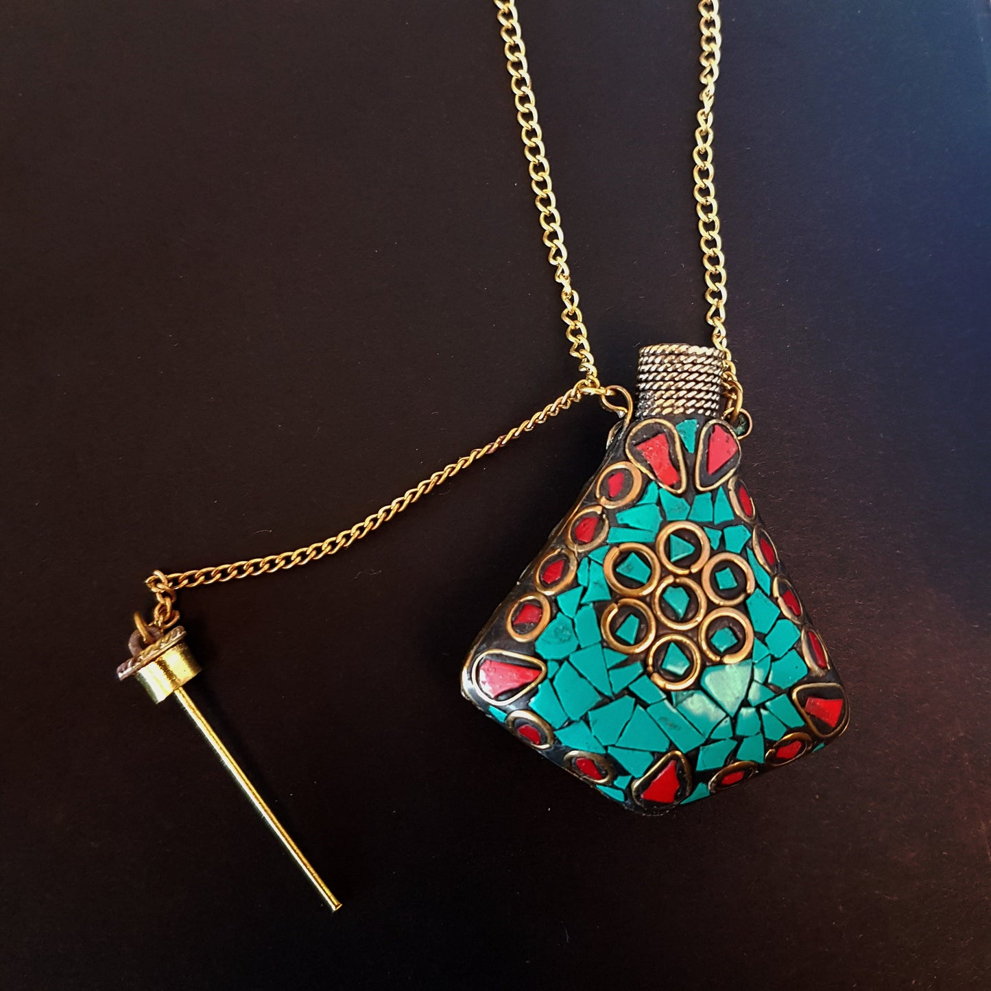 Perfume bottle pendant in a stone mosaic design. Inlaid withTibetan turquoise, lapis & MOP stones. Bottle closes with a brass wand stopper. - Vintage India Ca
