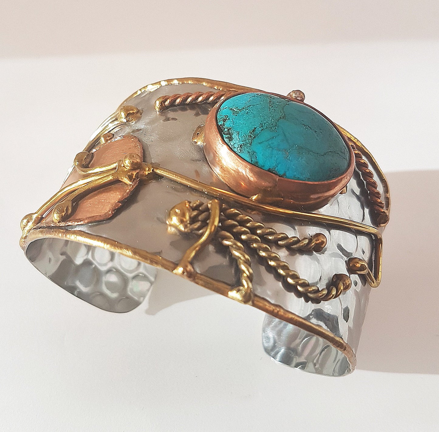 Vintage silver cuff bracelet with a Tibetan turquoise stone. Celtic trimetal medieval handwrought design. Copper & brass on silver metal. - Vintage India Ca