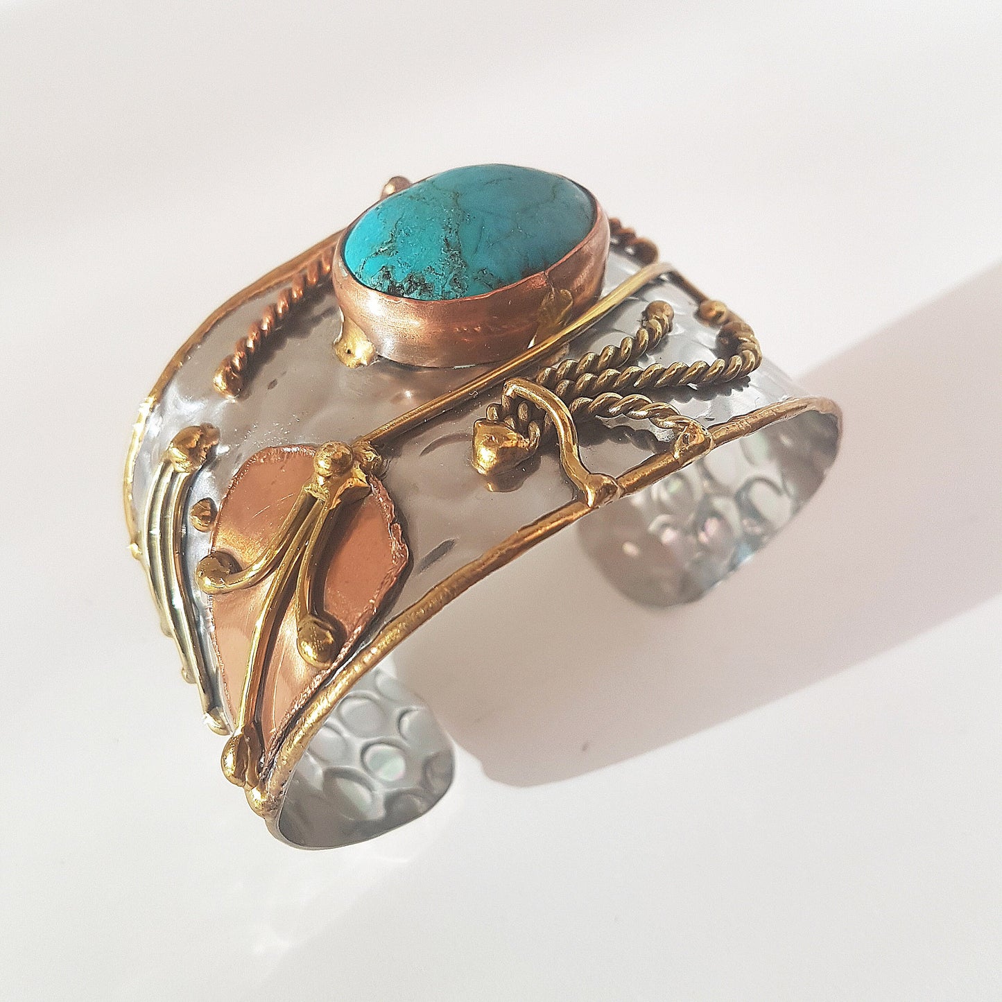 Vintage silver cuff bracelet with a Tibetan turquoise stone. Celtic trimetal medieval handwrought design. Copper & brass on silver metal. - Vintage India Ca