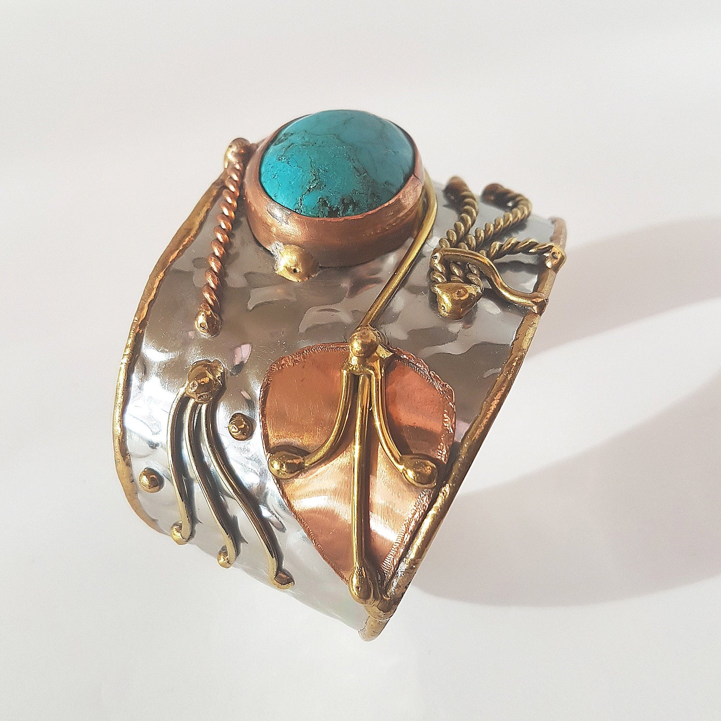 Vintage silver cuff bracelet with a Tibetan turquoise stone. Celtic trimetal medieval handwrought design. Copper & brass on silver metal. - Vintage India Ca