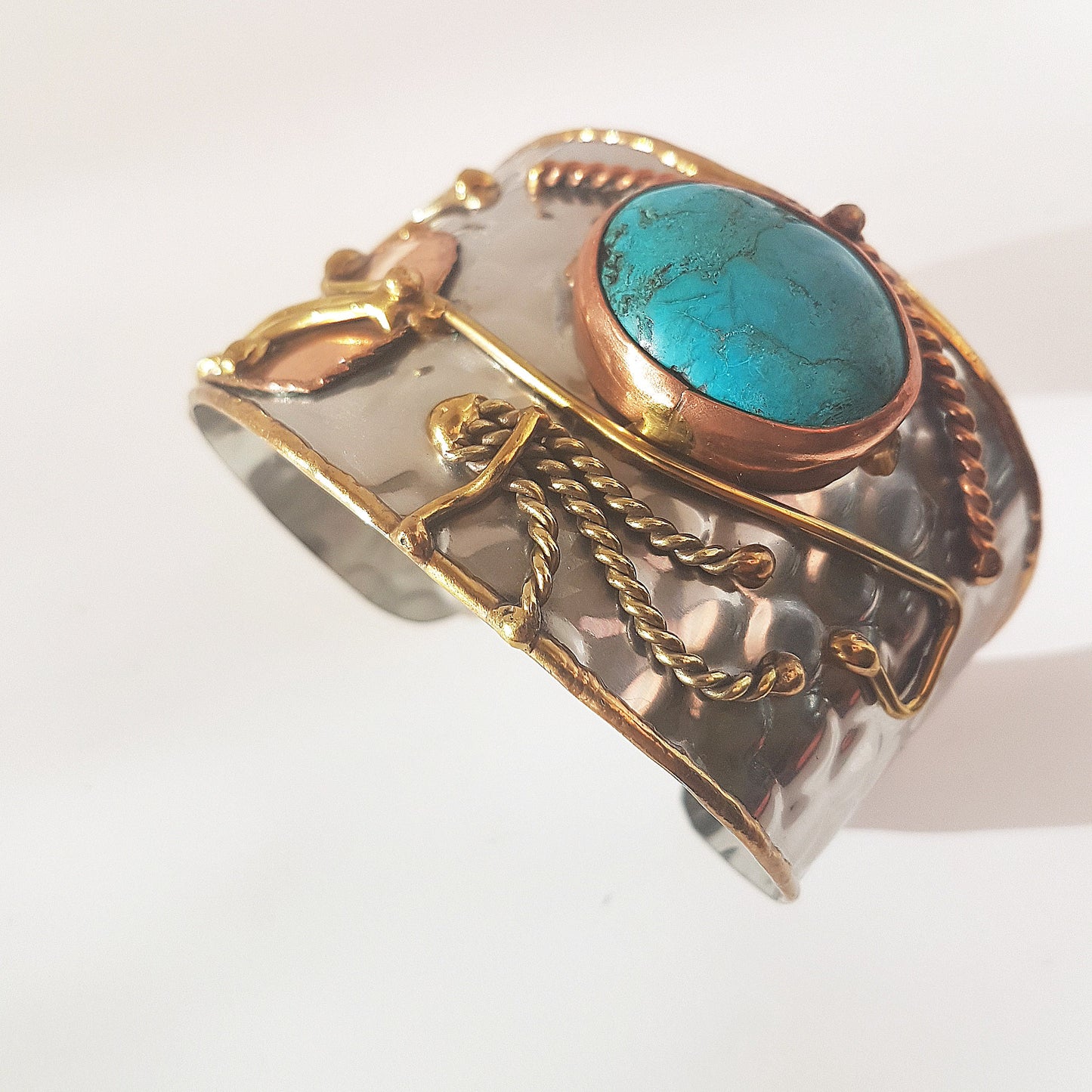 Vintage silver cuff bracelet with a Tibetan turquoise stone. Celtic trimetal medieval handwrought design. Copper & brass on silver metal. - Vintage India Ca