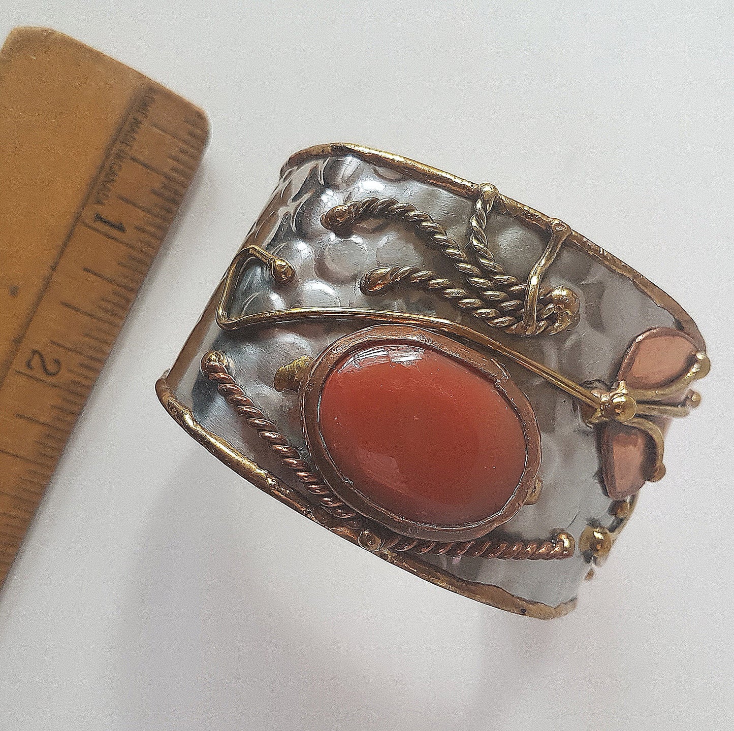 Vintage silver cuff bracelet with a large oval carnelian stone. Celtic trimetal medieval handwrought design. Copper & brass on silver metal. - Vintage India Ca