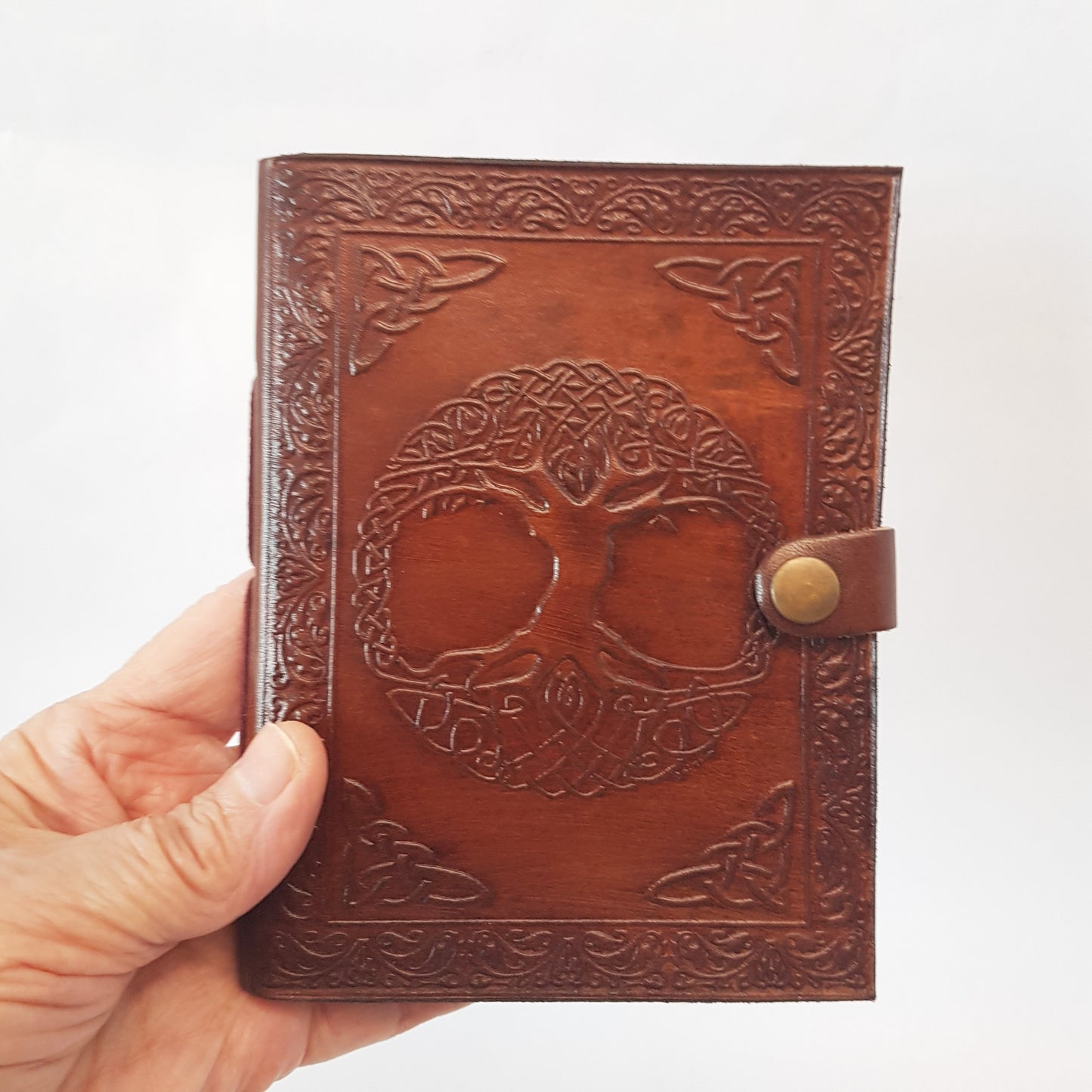 Leather bound journal with a hand embossed Celtic Tree cover design.