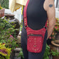 Utility festival belt. Unisex design maroon waist-hip-bum bag. Convertible as cross body shoulder bag. 5 pockets- 3 zip. Adjustable to 48 inches.