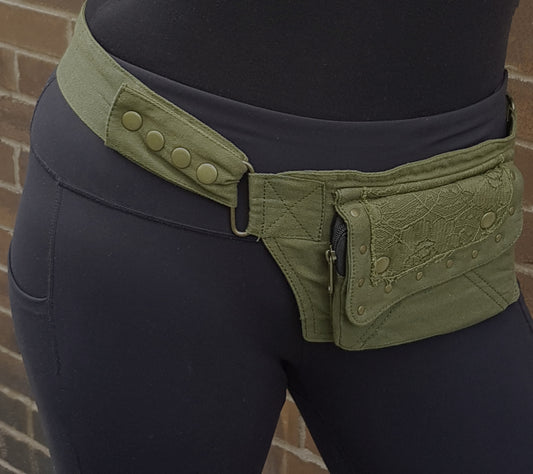 Utility festival belt army green. Lace detail design in army green tone. Use as travel & shopping money belt. Adjustable to 48 inches. Compact model with 2 pockets.
