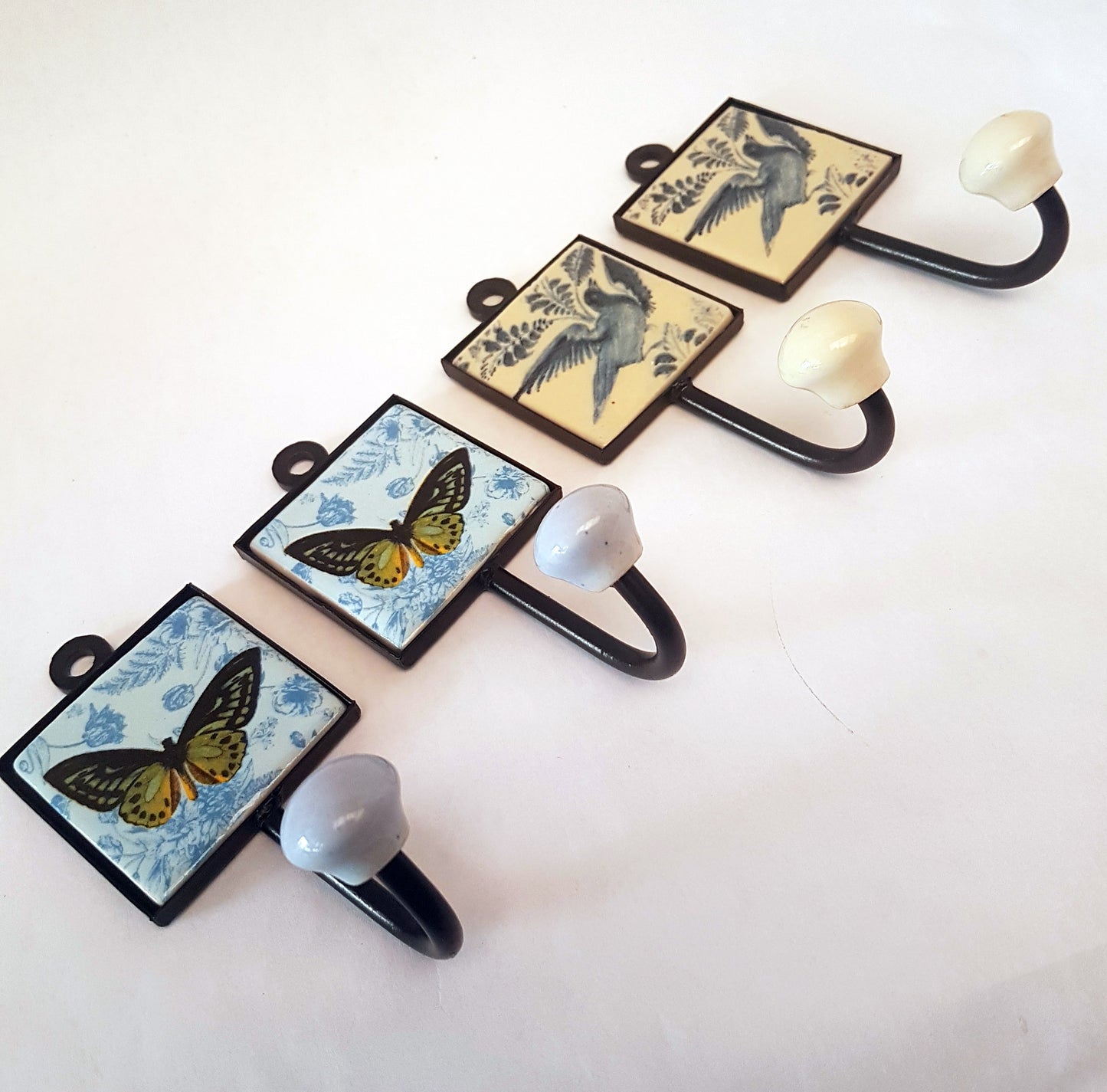 Set of 4 Antique blue Delft design bird & butterfly wall hanger hooks.