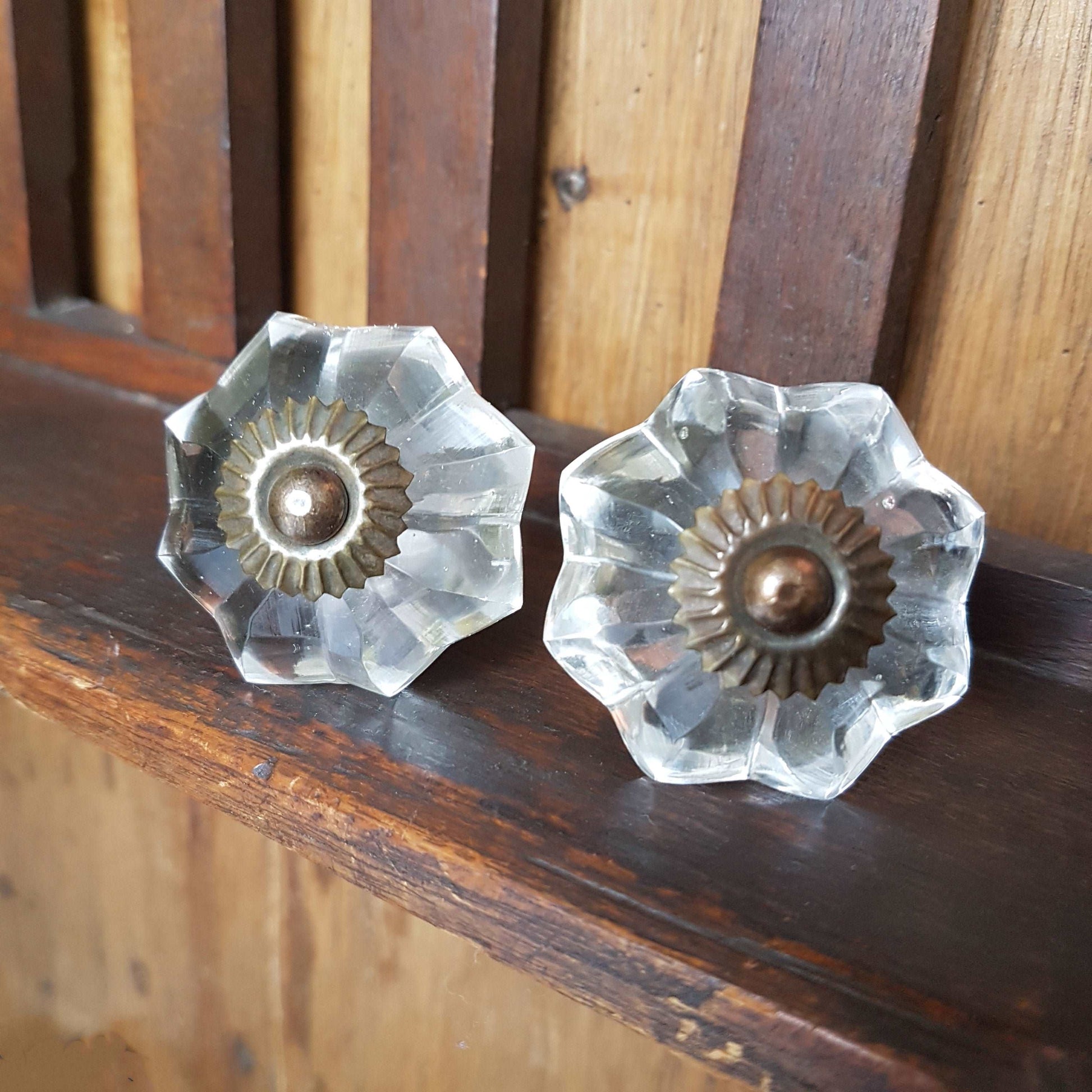 12 clear crystal cabinet knobs. Cut glass pulls in melon shape.