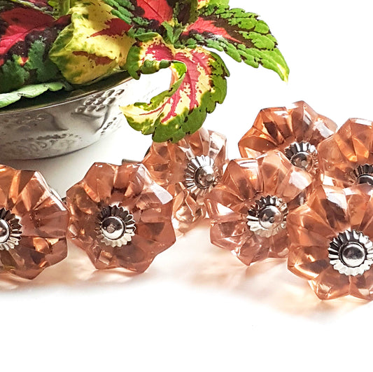 8 cranberry glass cabinet knobs with silver centers. Transparent pink cut glass drawer pulls. For kitchen cupboards, dressers, vanities.