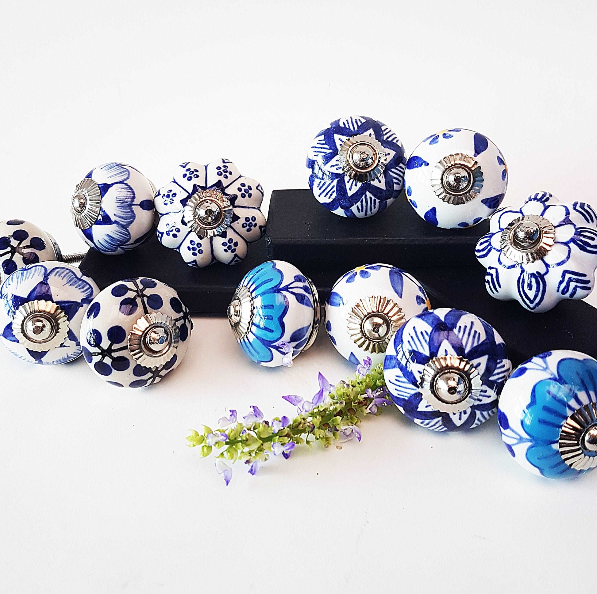 12 piece set of Delft style blue and white cabinet knobs/drawer pulls.