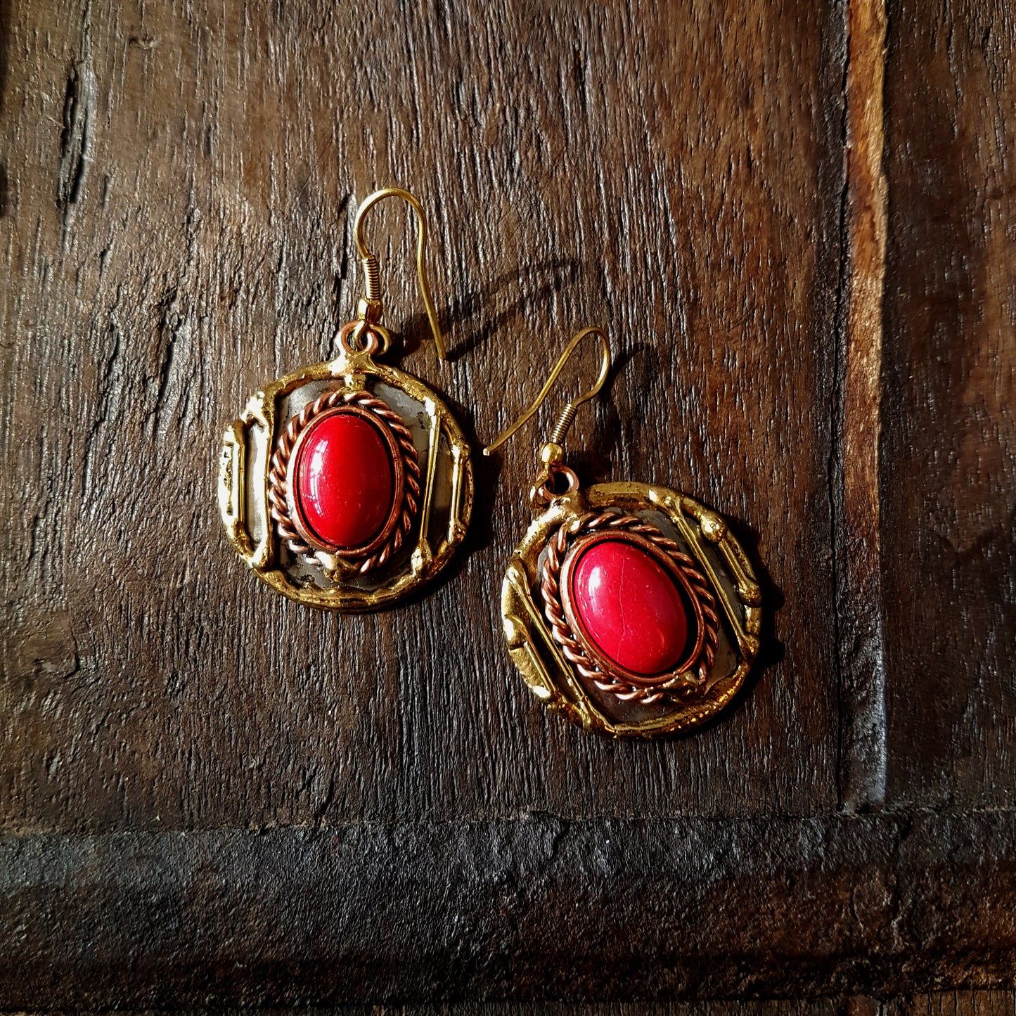 Red agate earrings in a hammered silver & mixed metal design. Stunning and unique!