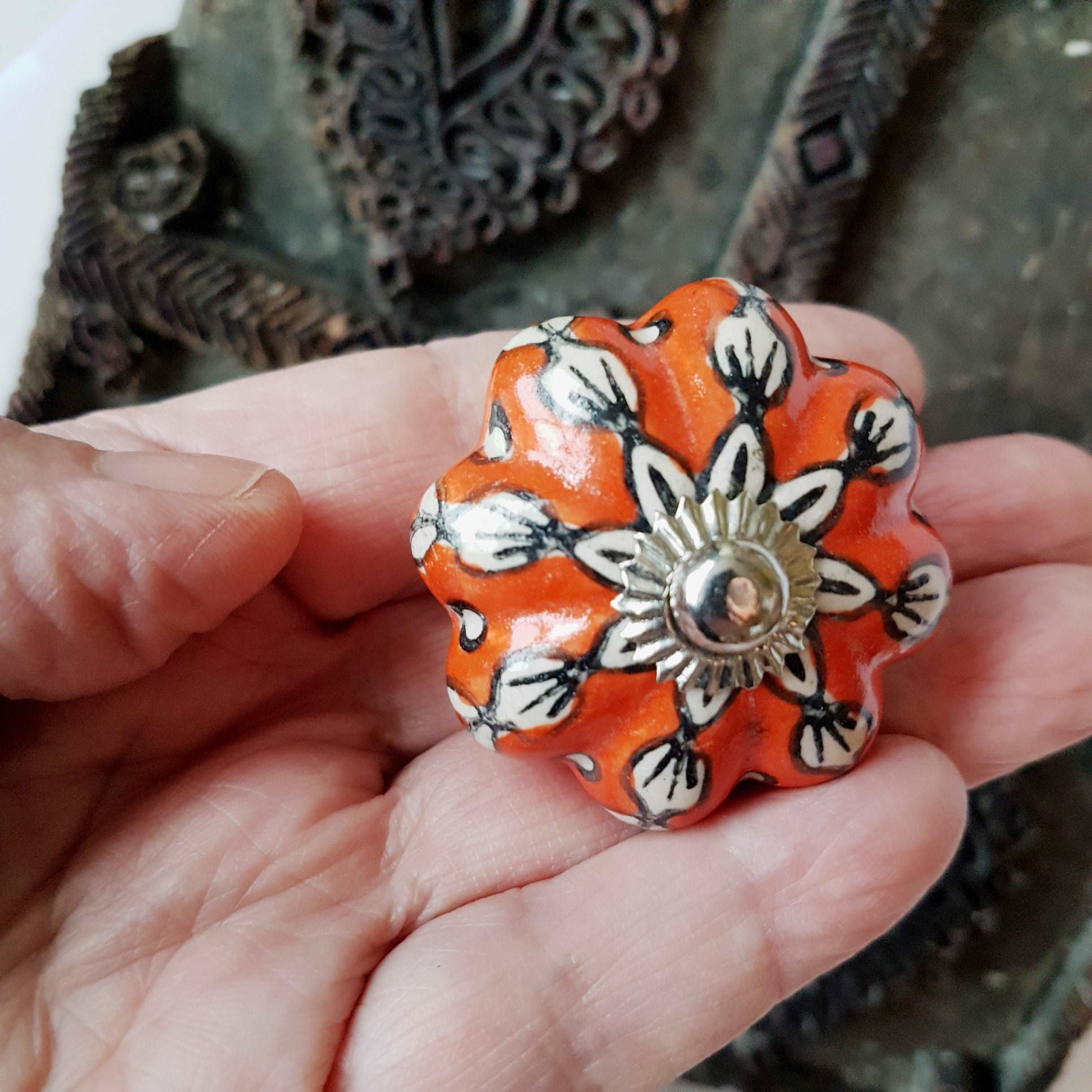6 cabinet knobs Dolce exclusive collection. Hand painted floral ceramic art. Drawer pulls. one and one half inches in diameter