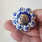 Ceramic cupboard-drawer knobs-pulls set of 8. Blue and white, unique hand painted floral designs. One and a half inch diameter.