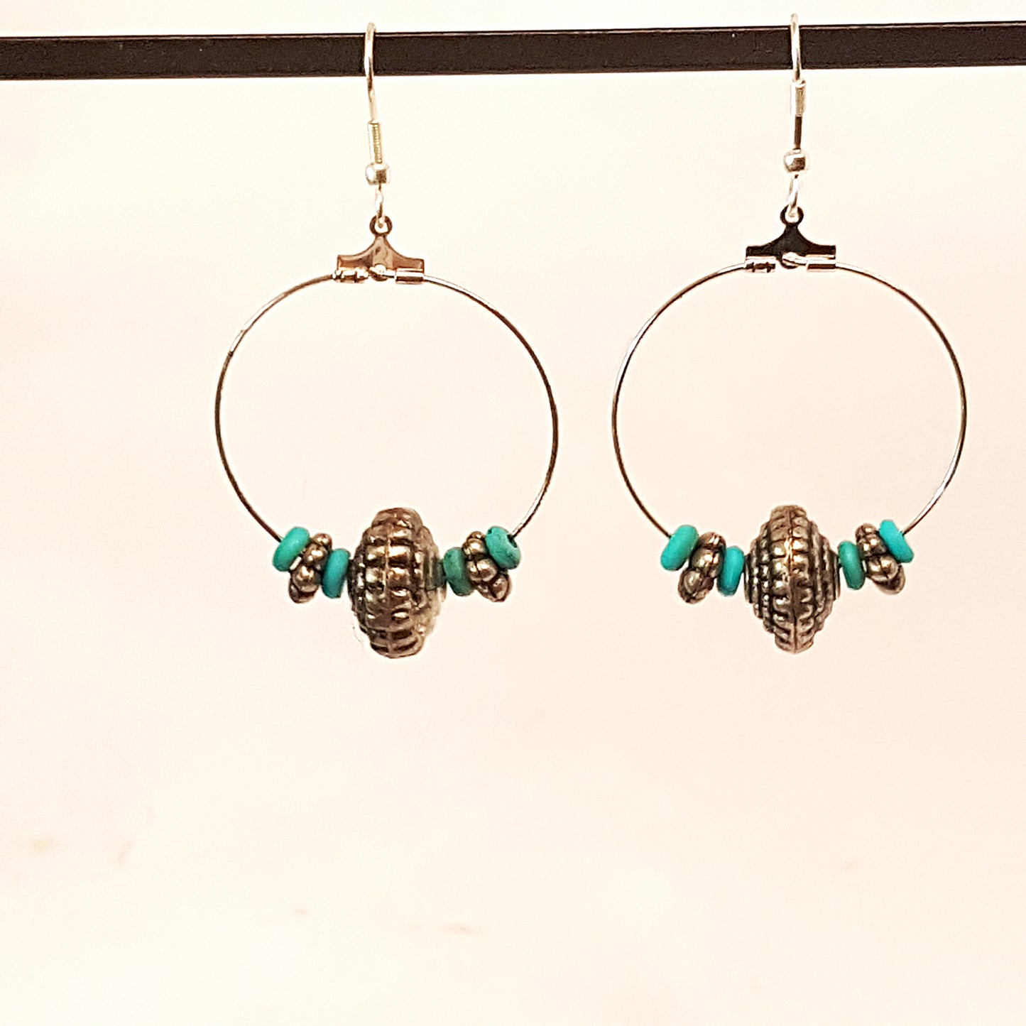 Silver hoop earrings with engraved vintage pewter beads & turquoise stones.