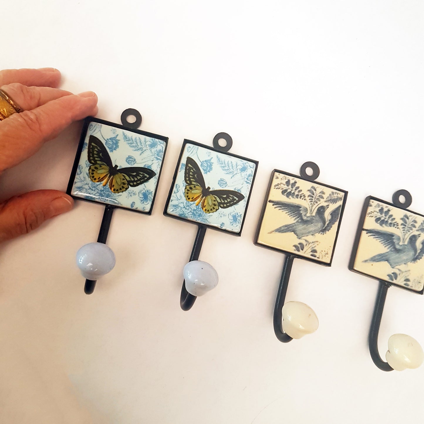 Set of 4 Antique blue Delft design bird & butterfly wall hanger hooks.