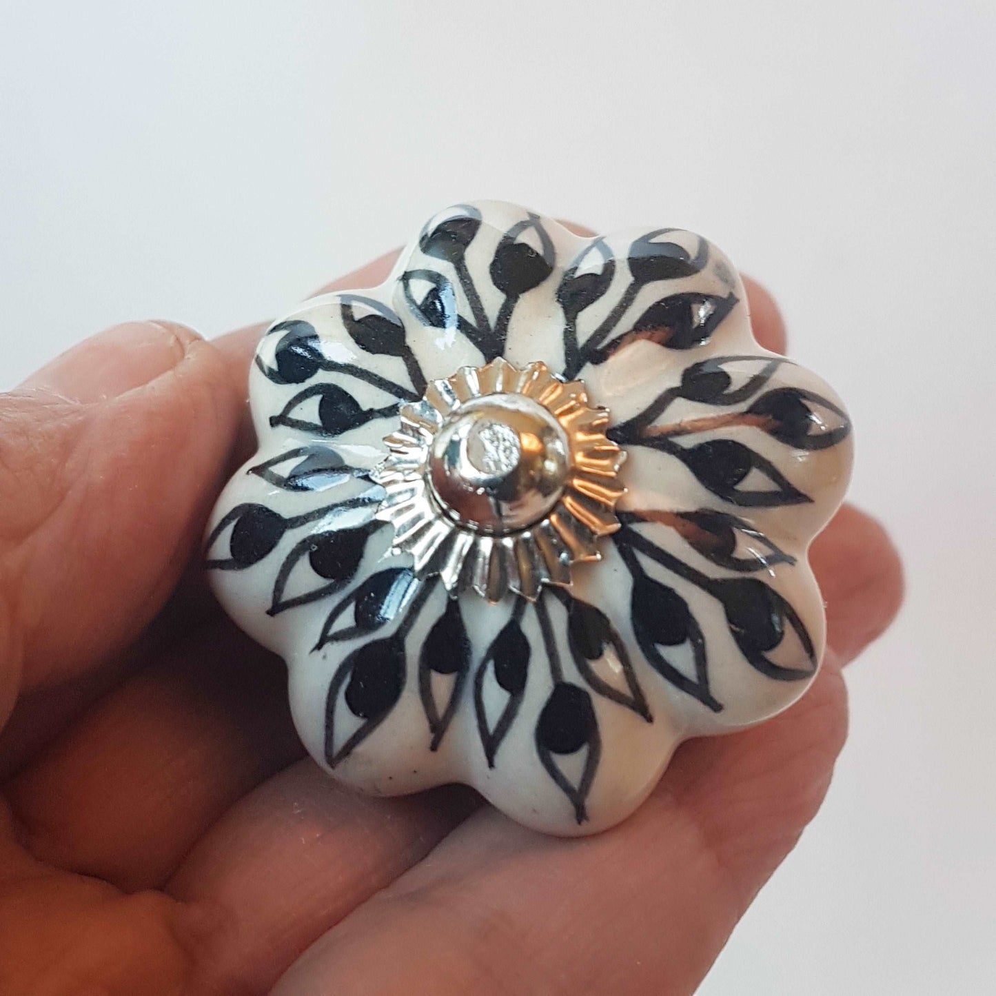 Andromeda set of 8 hand painted cabinet drawer knobs with botanical patterns in black & white.  Exclusive designer collection. In stock now!