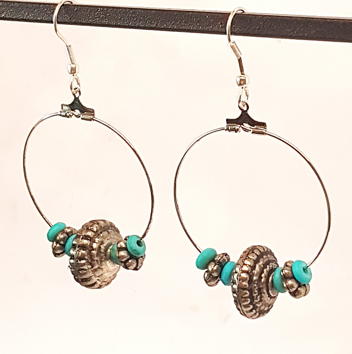 Silver hoop earrings with engraved vintage pewter beads & turquoise stones.