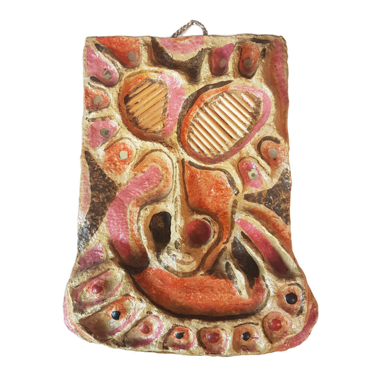 Vintage mixed media wall art mask. Pink and orange. 12 inches high.