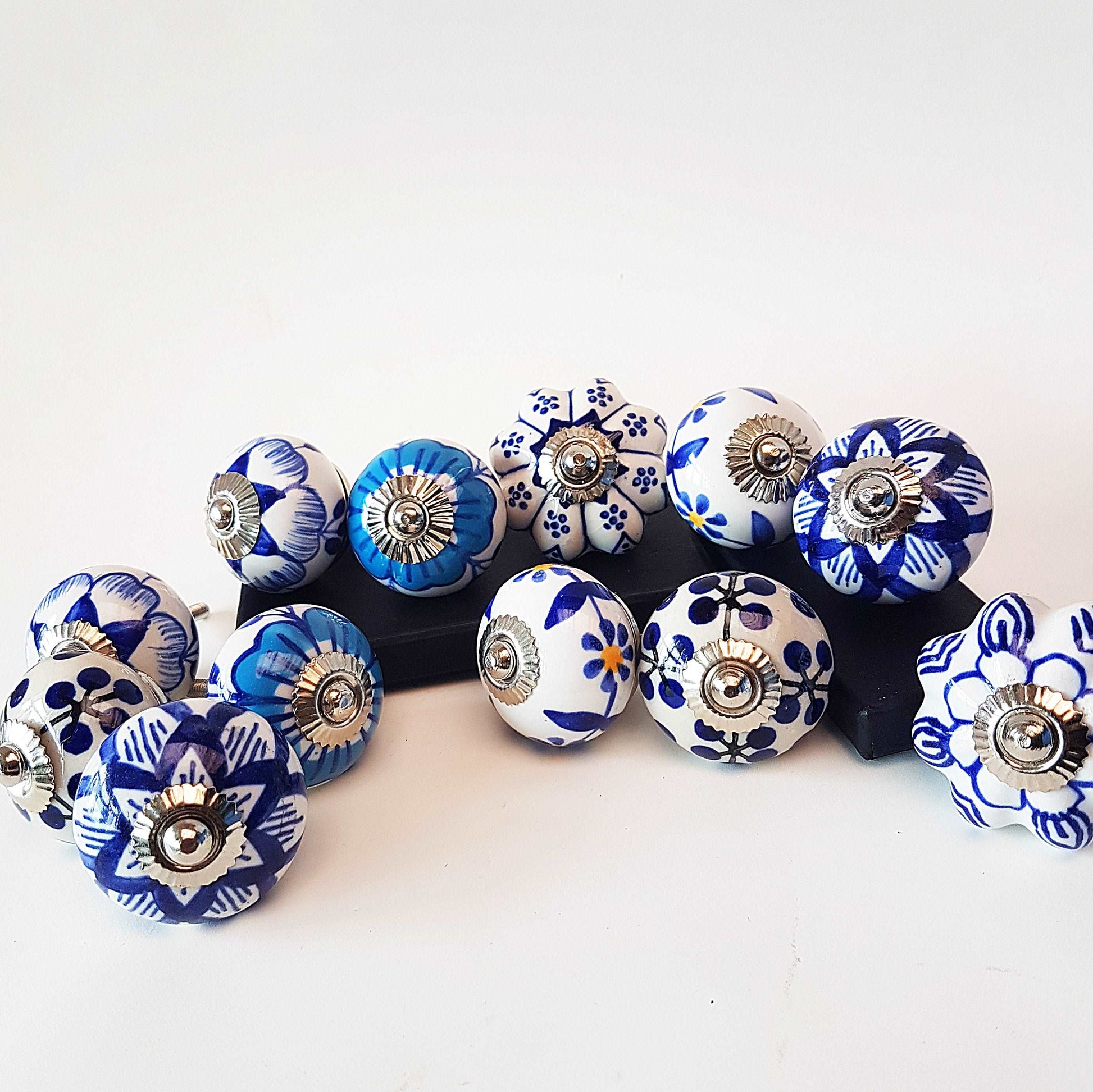 12 piece set of Delft style blue and white cabinet knobs/drawer pulls.