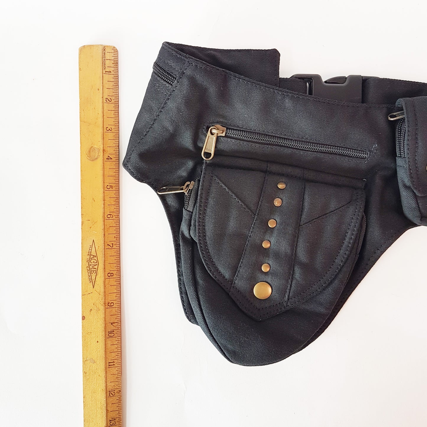 Utility festival pocket belt gray. Adjusts to 48 inches. Unisex design waist-hip-bum bag. Use as travel & shopping money belt. 4 zip pockets. Adjustable to 48 inches.