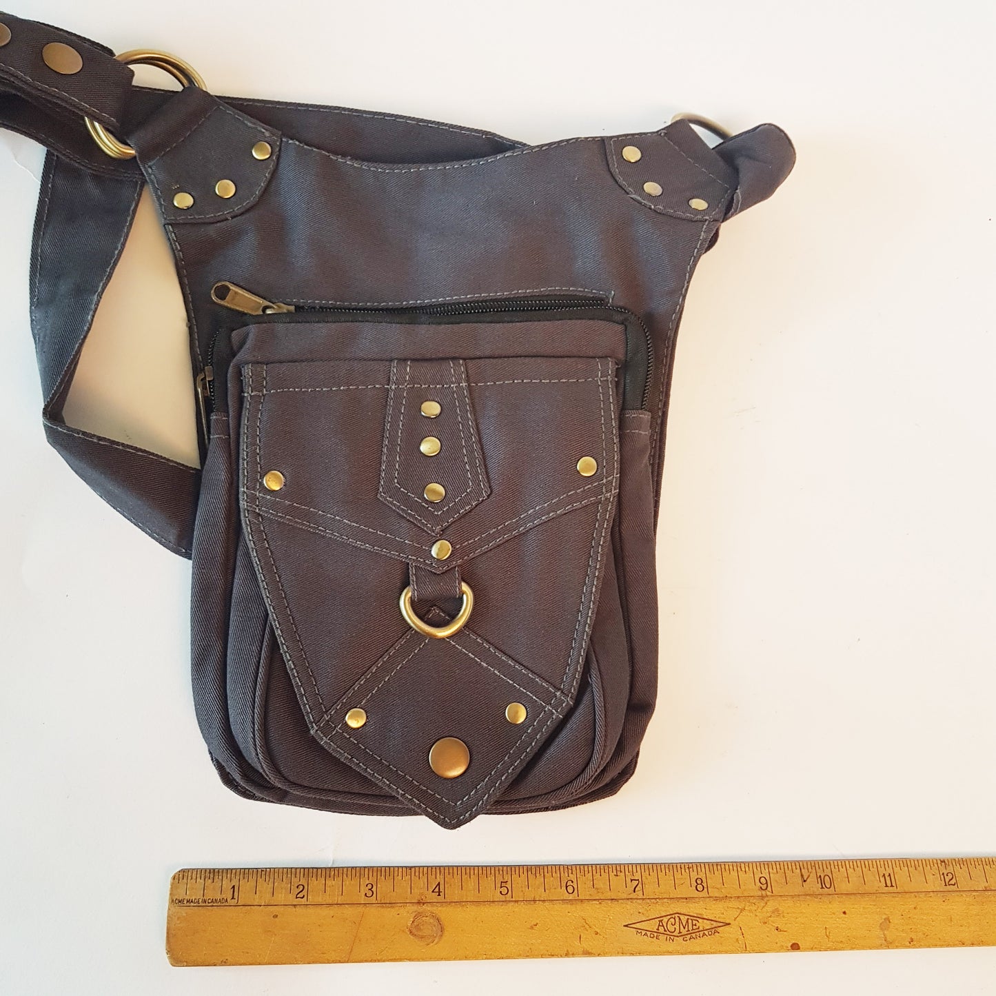 Utility festival belt. Unisex design gray waist-hip-bum bag. Convertible as cross body shoulder bag. 5 pockets- 3 zip. Adjustable to 48 inches.