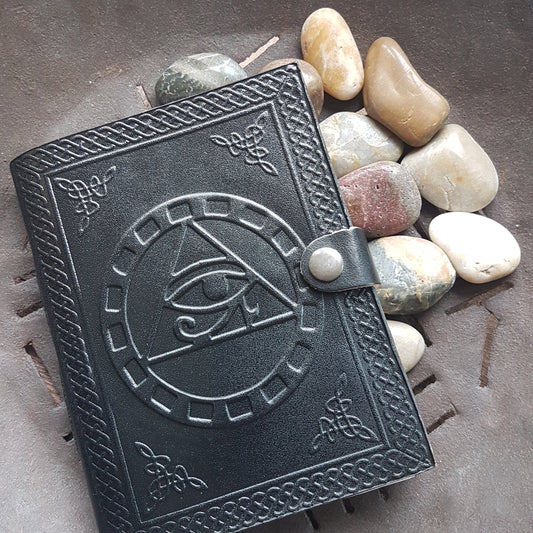 Black Leather bound blank book with an embossed Eye of Horus cover.