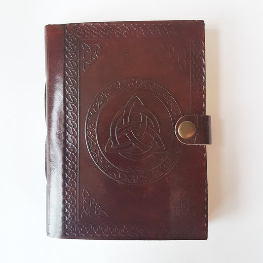 Leather bound journal/blank book. Hand tooled triquetra design cover.