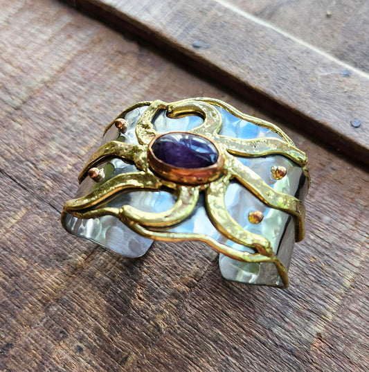 Silver cuff  bracelet with a dark purple Amethyst Stone. Adjustable fit.