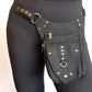 Utility pocket belt adjustable to 48 inch waist/hip. Black with silver metal.