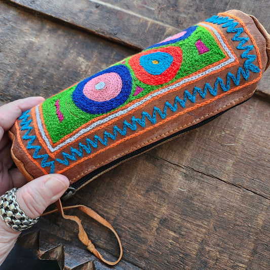 Leather Tube Pouch with a Colorful Hand Embroidered Boho Hippie design.
