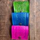 Set of 3 Colorful Engraved Leather 3 Inch Pocket Diaries.
