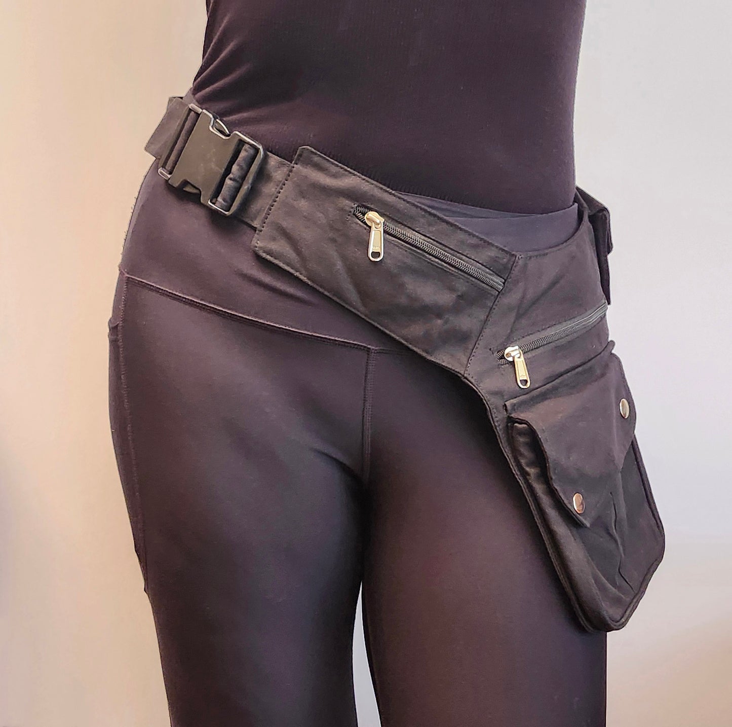 Utility festival belt in black,army green, blue. Unisex travel & shopping money belt.  Adjustable to 48 inches. 6 pockets-4 zip, 2 cargo . Handy coin pouch.