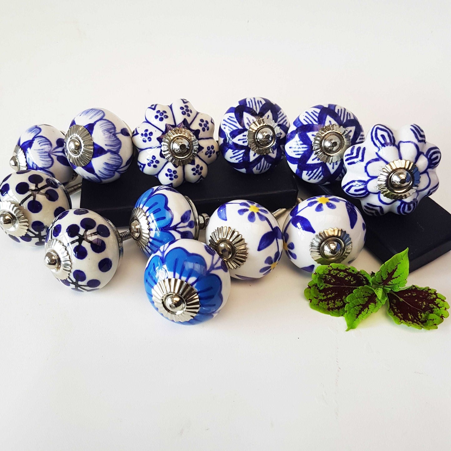 12 piece set of Delft style blue and white cabinet knobs/drawer pulls.