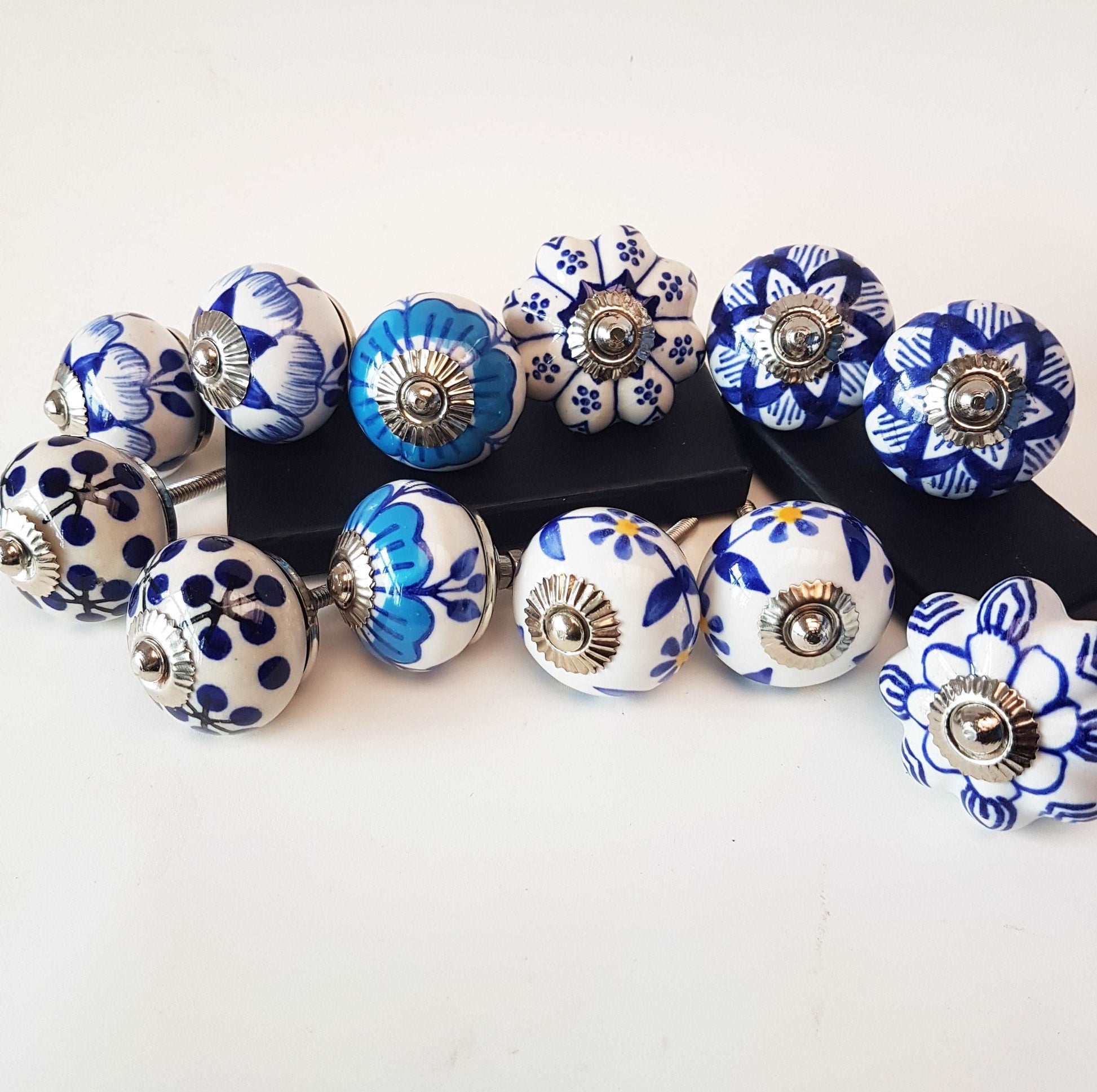 12 piece set of Delft style blue and white cabinet knobs/drawer pulls.