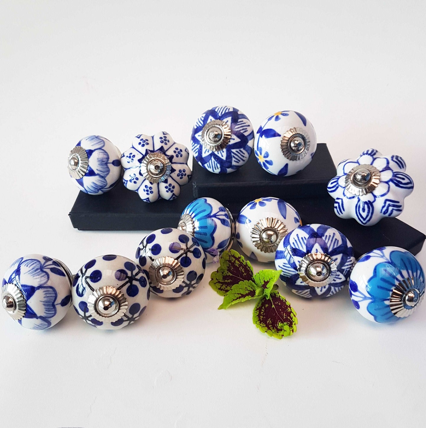 12 piece set of Delft style blue and white cabinet knobs/drawer pulls.