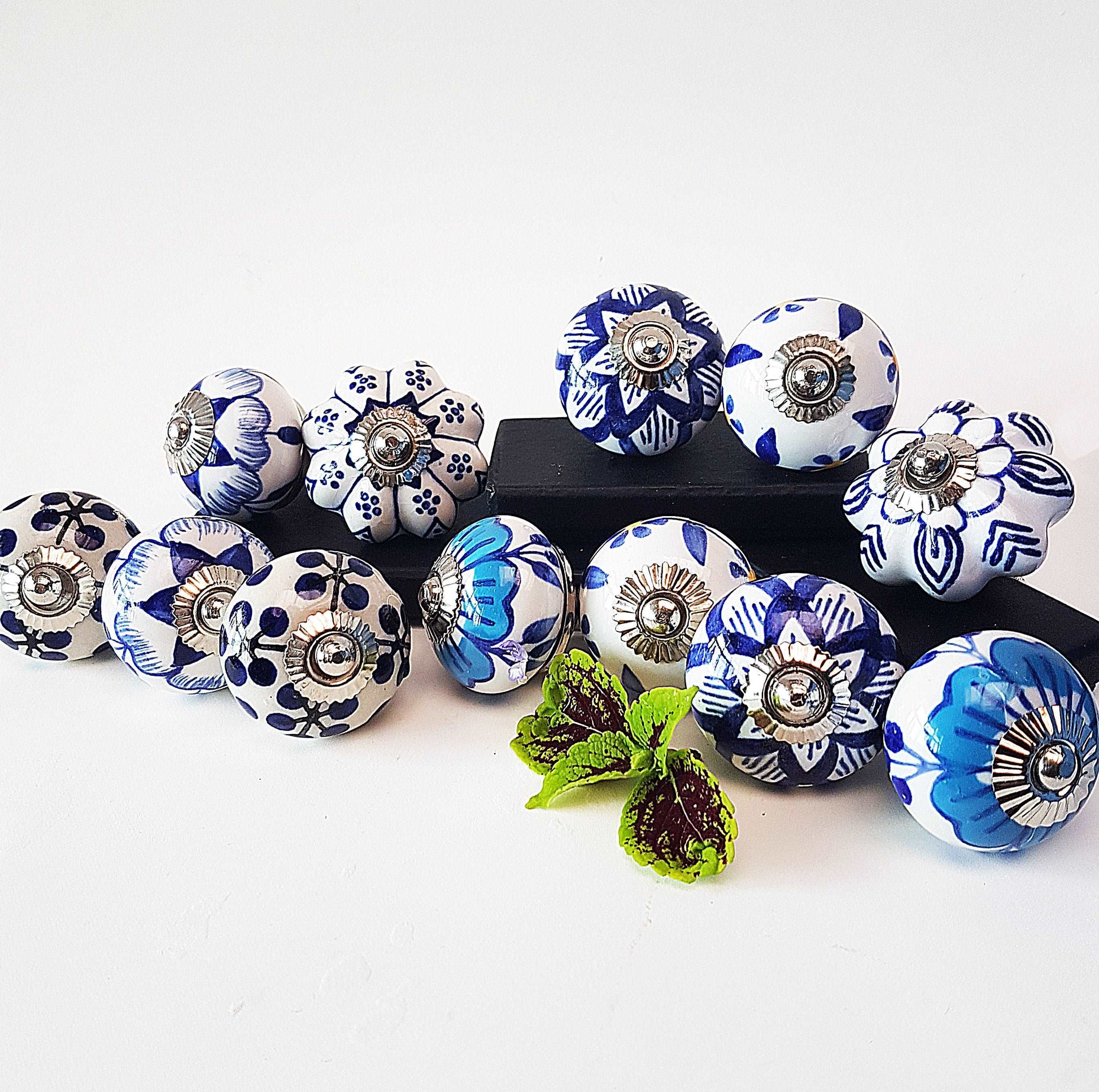 12 piece set of Delft style blue and white cabinet knobs/drawer pulls.