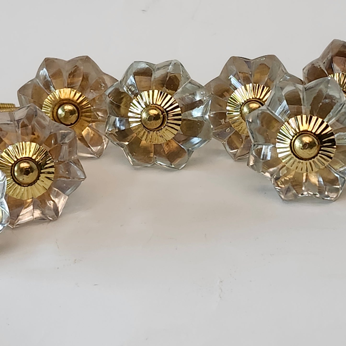 12 clear crystal cabinet knob pulls scalloped shape with large gold centers & hardware.