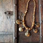 Bronze metal disc pendant necklace with rustic handmade beads.  Classic old world tribal design 19 inches long. Versatile casual to dressy. - Vintage India Ca