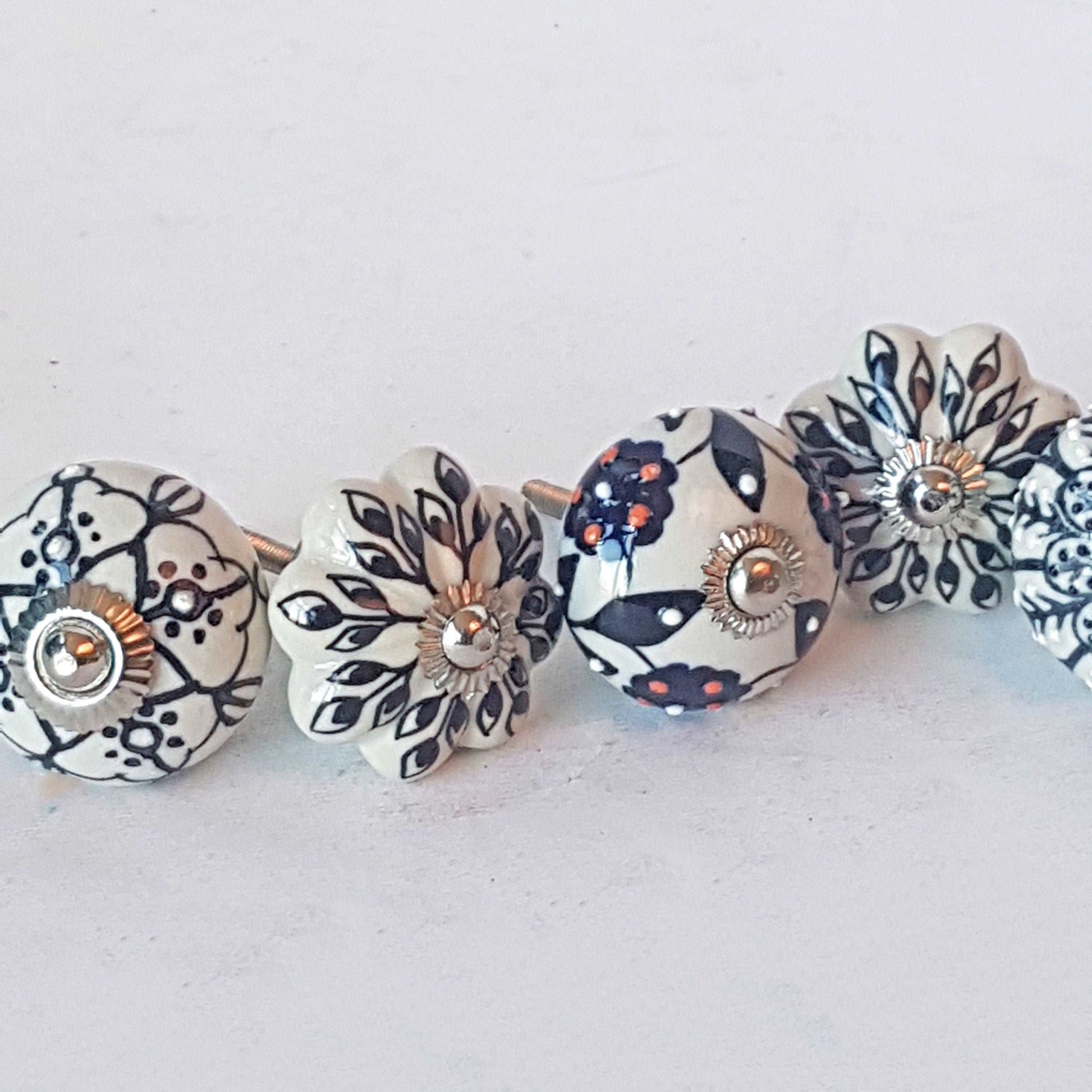 Andromeda set of 8 hand painted cabinet drawer knobs with botanical patterns in black & white.  Exclusive designer collection. In stock now! - Vintage India Ca