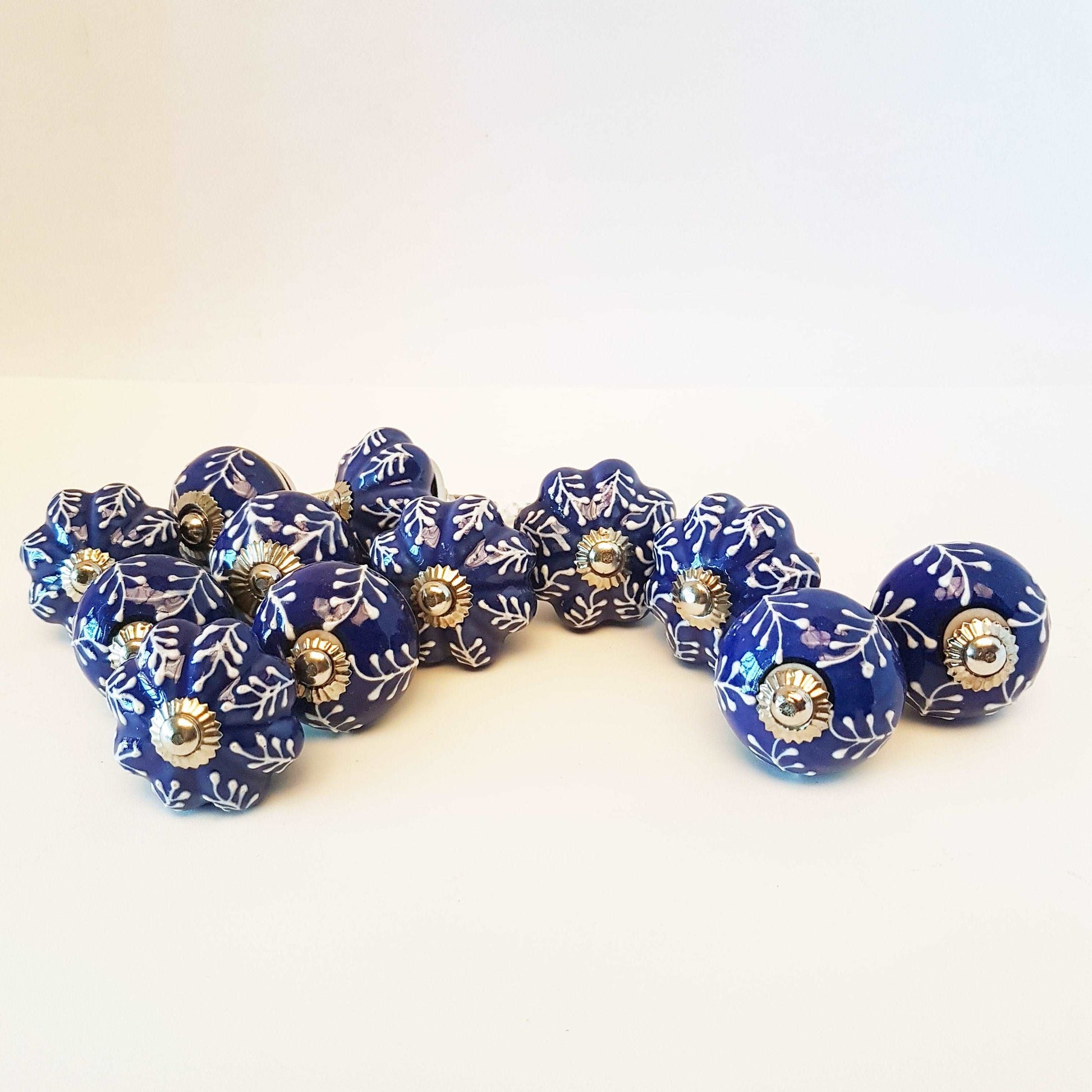 12 piece cabinet knob set. Delft cobalt blue and white drawer pulls. Each knob pull is hand painted and embossed in a botanical fern design. - Vintage India Ca