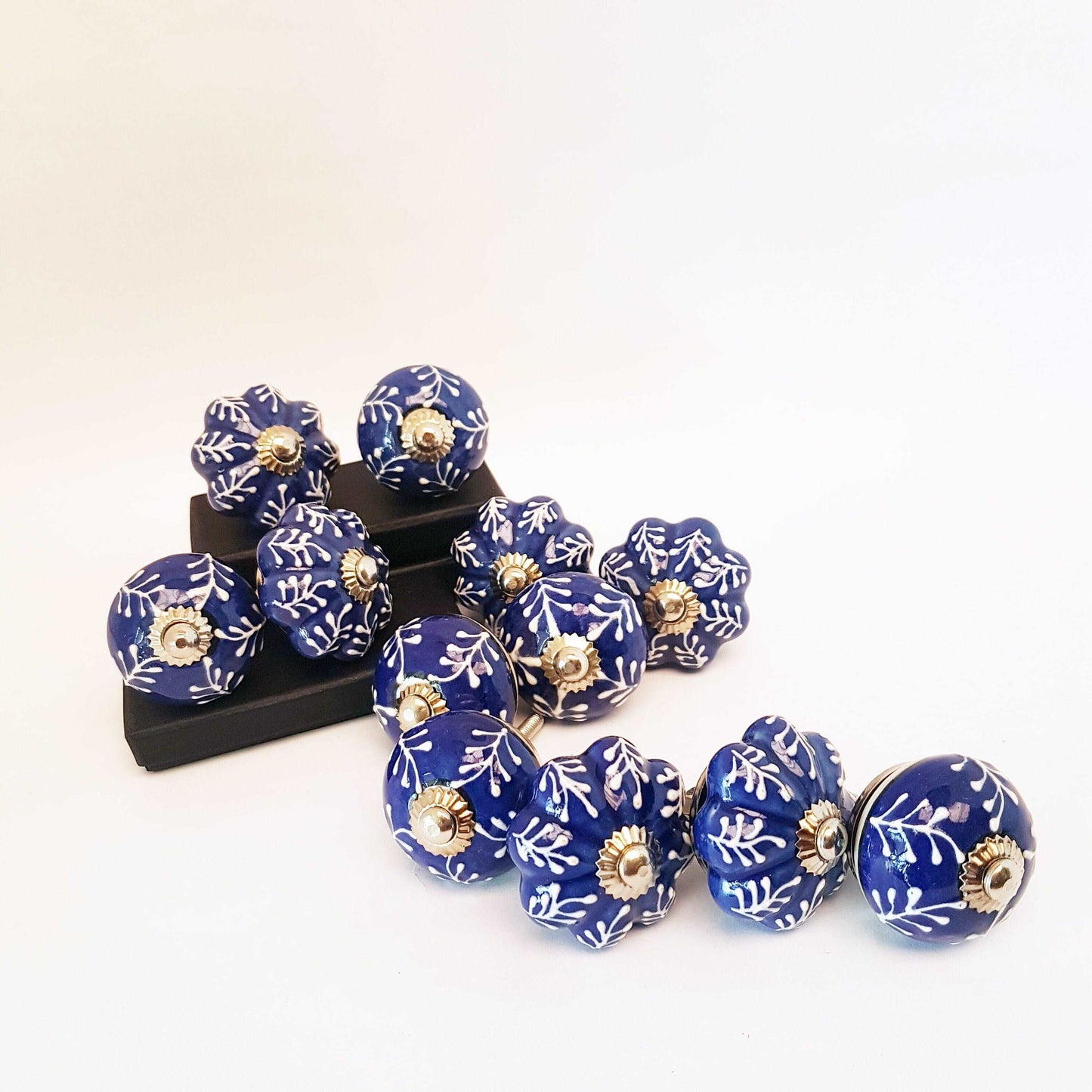 12 piece cabinet knob set. Delft cobalt blue and white drawer pulls. Each knob pull is hand painted and embossed in a botanical fern design. - Vintage India Ca