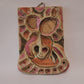 Vintage mixed media wall art mask.  Pink and orange. 12 inches high.