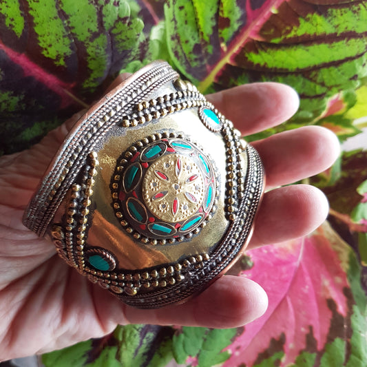 Vintage medieval style bronze cuff bracelet. Set with Tibetan turquoise & coral stones. Spectacular gender neutral golden tone armour cuff.