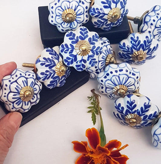 Set of 24 Delft Pattern Blue & White Cabinet Knob Drawer Pulls. Hand painted in vintage style floral patterns. Kitchen cabinet hardware.