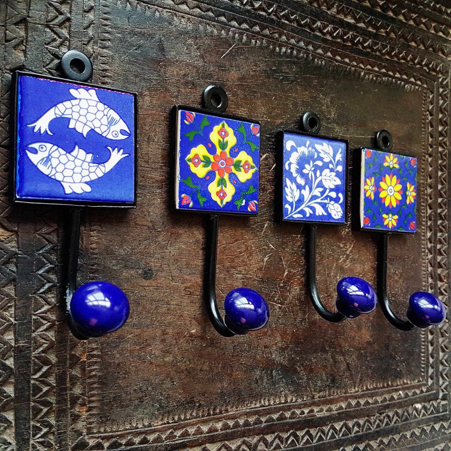 Set of 4 Avanti wall hooks for kitchen, bedroom & bath. Exclusive designs in rich blue color combos. Hand painted exclusive designs.