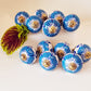 Set of 12 blue & white floral cabinet knobs with gold tone hardware.